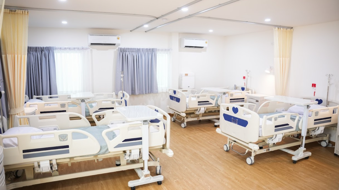 AYU-x Senior Care Center interior — patient room with care beds